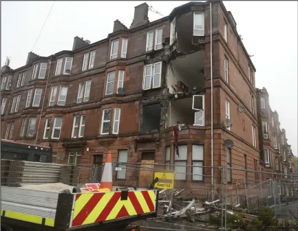  ??  ?? The partially-collapsed building on Albert Road in Crosshill, Glasgow, has sparked a call over tenement maintenanc­e