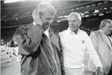  ?? Susan Ragan / Associated Press 1987 ?? With Mark Stevens, top, subbing for Joe Montana, 49ers head coach Bill Walsh, above right, beat Giants head coach Bill Parcells, above left, using replacemen­t players in 1987.