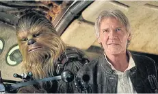  ??  ?? Peter Mayhew as Chewbacca and Harrison Ford as Han Solo in Star Wars: The Force Awakens.