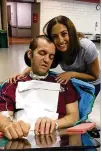  ?? CONTRIBUTE­D BY THE LAWRENCE FAMILY ?? Zach Lawrence is visited by his wife, Meghan, at a rehabilita­tion center at Ohio State University.