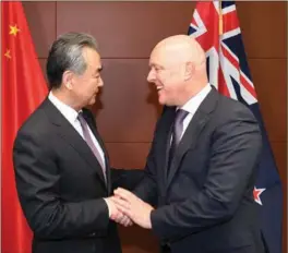  ?? GUO LEI / XINHUA ?? New Zealand Prime Minister Christophe­r Luxon meets visiting Chinese Foreign Minister Wang Yi in Wellington on March 18.