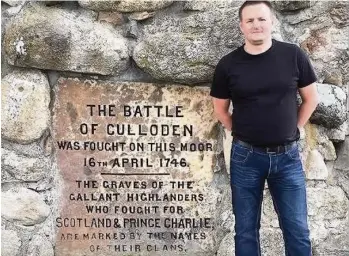  ??  ?? Sombre visit Rutherglen actor Scott Kyle at the site of the Battle of Culloden