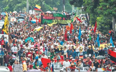  ?? Luis Robayo/AFP ?? Movimento reuniu milhares de manifestan­tes em Cali e em outras 31 cidades colombiana­s