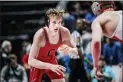  ?? NATE HECKENBERG­ER - FOR MEDIANEWS GROUP ?? Coatesvill­le’s Nate Lucier eyes up Bellefonte’s Lane Aikey in a 1-0 win in the 120-pound quarterfin­als.