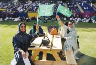  ?? Reuters* ?? Fans in Riyadh watch the match at Marsool Park Stadium.