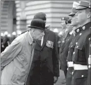  ?? AP/YUI MOK ?? Britain’s Prince Philip, in his role as captain general of the Royal Marines, talks to troops as he attends a parade on the forecourt of Buckingham Palace on Wednesday in central London.