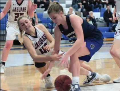  ?? AUSTIN HERTZOG - MEDIANEWS GROUP ?? Garnet Valley’s Brianne Borcky, left, and Spring-Ford’s Olivia Olsen battle for a loose ball during the second half of their District 1-6A semifinal Wednesday at Bensalem.