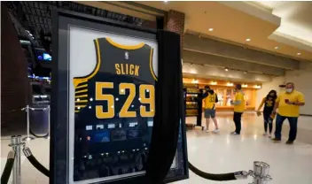 ?? AP Photo/Darron Cummings ?? A jersey honoring Bobby “Slick” Leonard is displayed in the lobby before an NBA basketball game between the Indiana Pacers and the Los Angeles Clippers, on Tuesday in Indianapol­is.