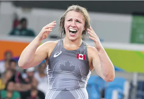  ?? TOSHIFUMI KITAMURA/AFP/GETTY IMAGES ?? Erica Wiebe came through for Canada, winning Olympic gold in the women’s 75-kilogram wrestling final.