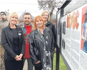  ?? Pictures: Gareth Jennings. ?? Fiona Dakers, John Crawford, Mary Renshaw and Rachel Jackson helped to unveil the new Bon Scott informatio­n board, while a fan, right, pays his own tribute.