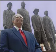  ?? North Carolina A&T / Courtesy photo ?? The late Franklin McCain Sr., grandfathe­r of Broncos rookie cornerback Mac McCain III, stands in front of the North Carolina A&T statue honoring him and three others who represent "The Greensboro Four."