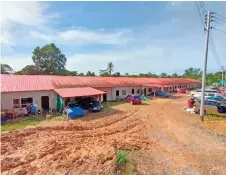  ?? — Photo by Peter Boon ?? Tuai Rumah Jackson Jelan hopes the access road to his 27-door longhouse at Mile 15, Jalan Oya, can be tar-sealed.