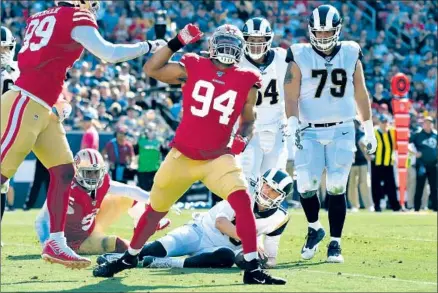  ?? Wally Skalij Los Angeles Times ?? RAMS QUARTERBAC­K Jared Goff is feeling down after being sacked by 49ers defensive end Solomon Thomas. Goff was sacked four times and completed 13 of 24 passes for a career-low 78 yards as he endured one of the worst games of his career Sunday.