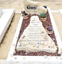  ??  ?? THE TERRORIST MURDER in Haifa of Guy Cafrey (his grave pictured) was initially treated as a criminal incident.