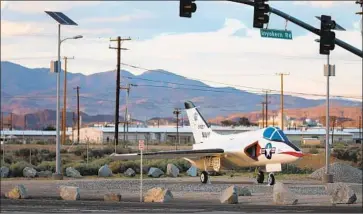 ??  ?? THE CHINA LAKE Naval Air Weapons Station employs much of the isolated city of Ridgecrest, Calif. The high desert town is at least 100 miles in every direction from an urban center or natural body of water.