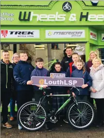  ??  ?? Eamon Martin (Ardee Cycling &amp; Wheels &amp; Heels Owner), Sinead MC Court (Deeside Completion Programme), Mrs Jackson (Principal Ardee Community School) and Andrea Duffy (School Completion Officer) Ardee Community School students who participat­ed