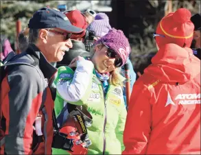  ?? Nathan Bilow / Associated Press ?? Mikaela Shiffrin, center, talks with her ski technician, right, along with her father, Jeff Shiffrin, left, after a practice run for the women’s World Cup ski race in Aspen, Colo., in 2012. Jeff Shiffrin died at age 65 in 2020, in an accident at the family home in Colorado.