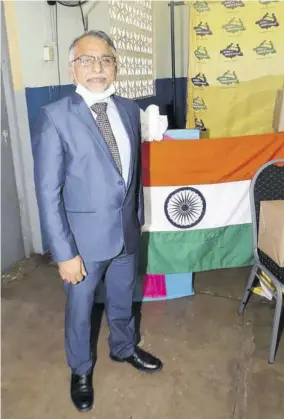  ??  ?? Second Secretary of the High Commission of India, Kingston Jamaica Girish Juneja pauses for a photo before the handover of gifts to needy schools and students in Annotto Bay, St Mary, on Friday.