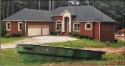  ?? JOHNNY EDWARDS/AJC ?? This house in Oxford, with an uninstalle­d swimming pool in the yard, is listed in public records as headquarte­rs for Let’s Talk About The Family Inc., which obtained a forgivable Paycheck Protection Program loan.