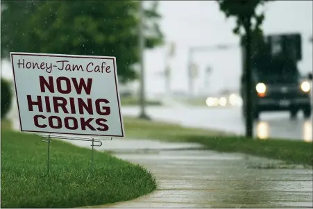  ?? NAM Y. HUH — THE ASSOCIATED PRESS FILE ?? Jobless claims dropped by 24,000to 400,000last week, the Labor Department reported Thursday, July 29, 2021.