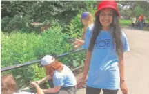  ??  ?? Shivani Patel, 16, from Philadelph­ia, was one of the teen volunteers sprucing up Humboldt Park Wednesday.
| STEFANO ESPOSITO/ SUN- TIMES