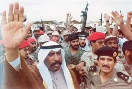  ??  ?? Then Crown Prince His Highness Sheikh Saad Al-Abdullah A-Sabah cheers with Kuwaiti soldiers following Kuwait’s liberation.