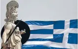  ?? Photo: REUTERS ?? While the Greek national flag flutters proudly next to a statue of ancient Greek goddess Athena, in Athens, the nation’s interior minister, Nikos Voutsis, has admitted the state is bankrupt.