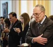  ?? ERIN SCHAFF / THE NEW YORK TIMES ?? U.S. Sen. Chuck Schumer, D-N.Y., seen Tuesday at a news conference, said “the time has come” to decriminal­ize marijuana in the U.S.
