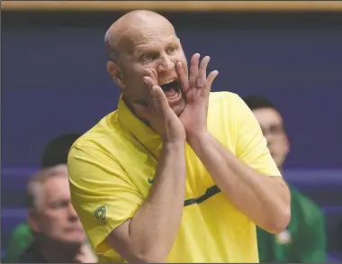  ?? The Associated Press ?? DUCK CALL: Oregon head coach Kelly Graves yells during the second half of the Ducks’ 74-65 upset victory over Duke in the NCAA women’s basketball tournament Monday night in Durham, N.C.