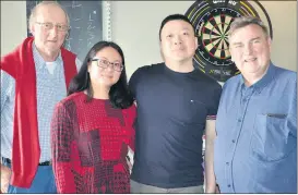  ?? (Pic: John Ahern) ?? Cllr Noel McCarthy (Tidy Towns chairman) and Ciaran O’Connor with sponsors, Tim Yan and Cindy Chen (The China Dragon) at last Saturday’s very successful coffee morning in The Wagon Tavern, Fermoy.