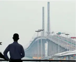  ??  ?? The world’s longest cross-sea bridge, the Hong Kong-Zhuhai-Macao Bridge, in Zhuhai city, South China’s Guangdong province.