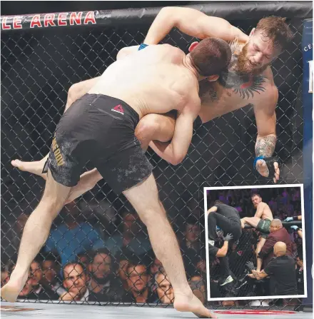  ?? FIGHT CLUB: Khabib Nurmagomed­ov taking down Conor McGregor and ( inset) McGregor getting out of the octagon. ??