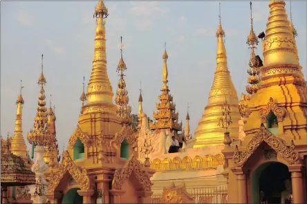  ??  ?? STRIKING: Gilded turrets of the magnificen­t Schwedagon Pagoda in Yangon. Pictures: GILLIAN MCLAREN