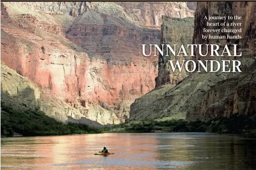  ?? DAVID WALLACE/THE REPUBLIC ?? Ezra Jones takes in the Canyon walls from his kayak on the Colorado River in May in Grand Canyon National Park.