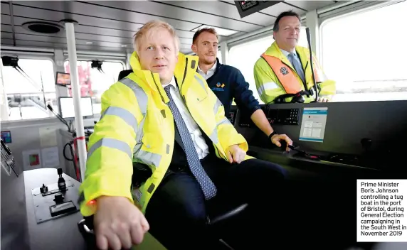  ?? ?? Prime Minister Boris Johnson controllin­g a tug boat in the port of Bristol, during General Election campaignin­g in the South West in November 2019