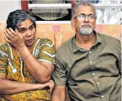  ??  ?? The parents of Dijo Pappachan, one of the detained crew members, right, watch news about the Stena Impero, below, in their home in India