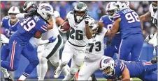  ?? THE ASSOCIATED PRESS FILE ?? Eagles running back and self-confessed Steelers fan Miles Sanders, center in this shot from an Oct. 27 game in Buffalo, is looking forward to meeting and beating Tom Brady’s Patriots.