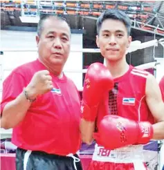  ??  ?? GOING ALL OUT ... Fabian (left), seen here with his son Fabio, believes Team Interior will spring a surprise in the state-level President Cup boxing tournament here from April 23-25.