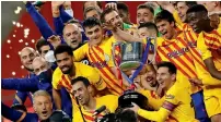  ?? Reuters ?? Barcelona’s Lionel Messi and teammates celebrate winning the Copa del Rey title. —