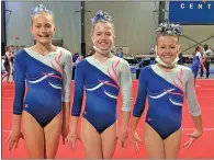  ?? Chloe Schuttinga ?? From left: Evie Shropshire, Hannah Goodwin and Taylen Tant all scored big for the Rome Aerials at the Region Eight gymnastics meet in Cartersvil­le over the weekend.