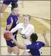  ??  ?? Colorado forward Charlotte Whittaker (45) passes the ball as Washington forward Khayla Rooks, (left), and guard Nia Lowery (15) defend during an NCAA college basketball game in the first round of the Pac12 women’s tournament, on March 3, in Las Vegas. (AP)