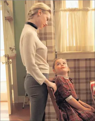  ?? Carin Baer AMC ?? RESTLESS HOUSEWIFE Betty (January Jones) shares a fractious bond with her daughter, Sally (Kiernan Shipka), who over the years encounters much emotional trauma as a Draper offspring.