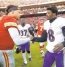  ?? JAMIE SQUIRE/GETTY ?? Chiefs quarterbac­k Patrick Mahomes, left, shakes hands with Ravens quarterbac­k Lamar Jackson after a 2018 game in Kansas City, Missouri.