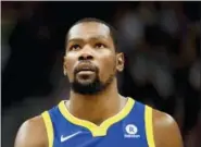  ?? ALEX GOODLETT — THE ASSOCIATED PRESS ?? Warriors forward Kevin Durant (35) looks on in the second half against the Jazz Tuesday in Salt Lake City.