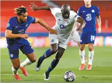  ?? AP-Yonhap ?? Porto’s Moussa Marega, right, duels for the ball with Chelsea’s Reece James during the Champions League quarterfin­al second-leg football match at the Ramon Sanchez Pizjuan stadium in Seville, Spain, Tuesday.