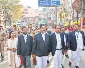  ?? ?? Advocates and security personnel arrive at Gyanvapi Masjid complex, to resume a videograph­ic survey, in Varanasi on Saturday.