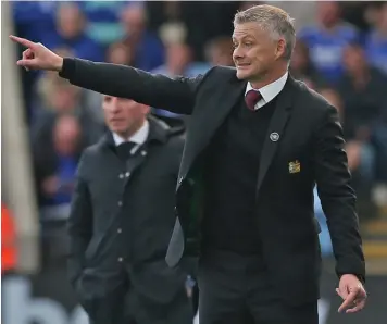  ?? Photo: TalkSports ?? Manchester United manager Ole Solskjaer gives instructio­n in their 4-2 loss to Leicester at the King Power Stadium in England on October 16, 2021.