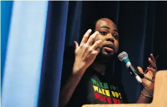  ?? DAVID KAWAI / OTTAWA CITIZEN ?? Jamaican-Canadian law student Anthony Morgan speaks to students at a Black History Month event Friday.