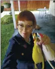  ?? PHOTO COURTESY OF MELISSA JEAN FOOTLICK ?? Melissa Jean Footlick, 42, of San Diego, shows off the rubber chickens from a game she purchased online. Footlick is among millions who have helped online retail sales surge during the pandemic.