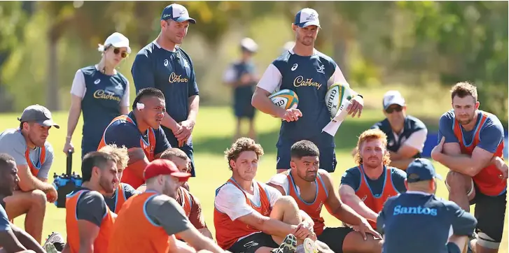  ?? Photo: Rugby.com.au ?? Dan Palmer (centre) and Berrick Barnes (right) have joined Eddie Jones’ coaching set-up.